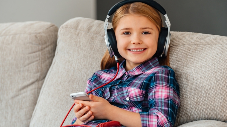 Little cutie loves music.