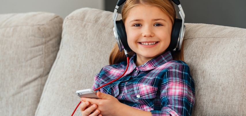 Little cutie loves music.