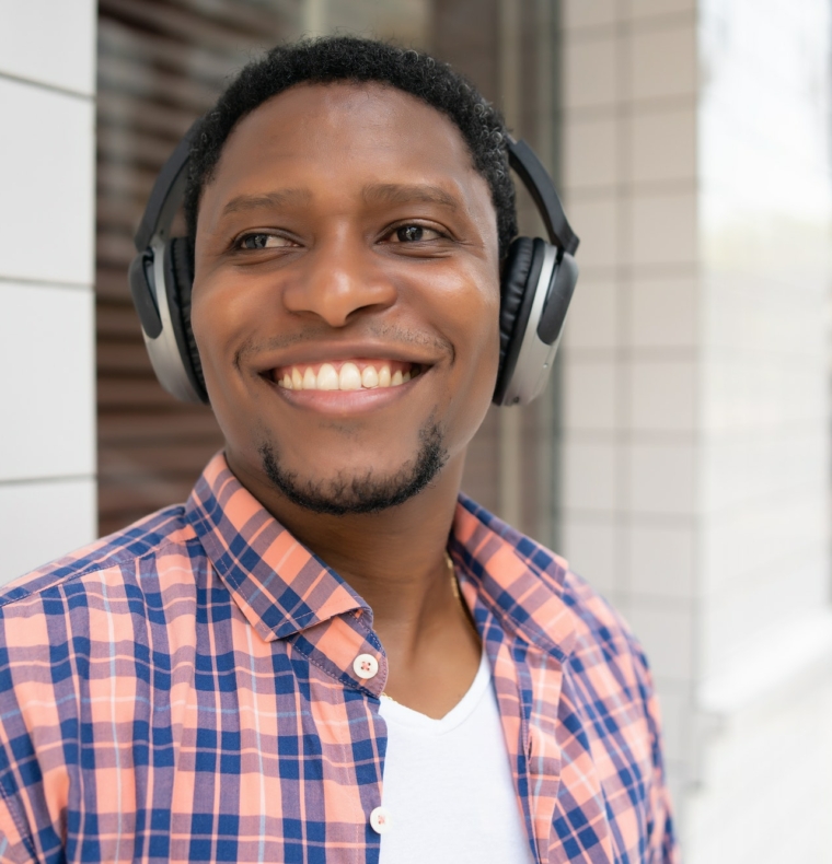 Man listening music with headphones.