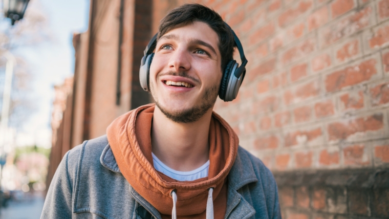 Man listening to music with headphones.