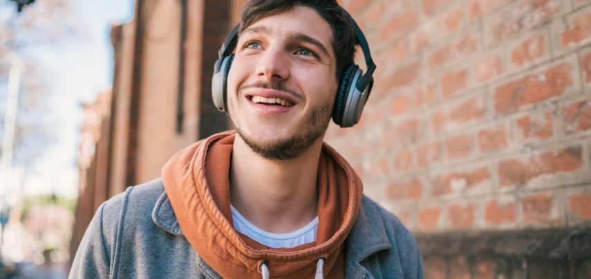 Man listening to music with headphones.