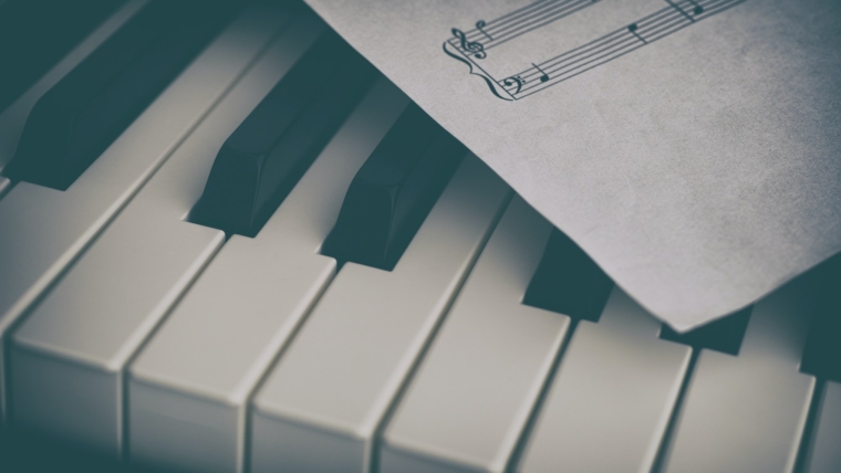 Piano and sheet music paper